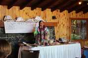 woman behind table image