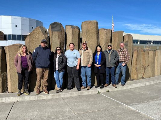 Health Team and Umatilla Staff photo by tall rocks