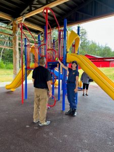 playground equipment inspection: measuring red ladder