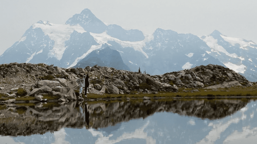 Mother and daughter in a mountain scenery